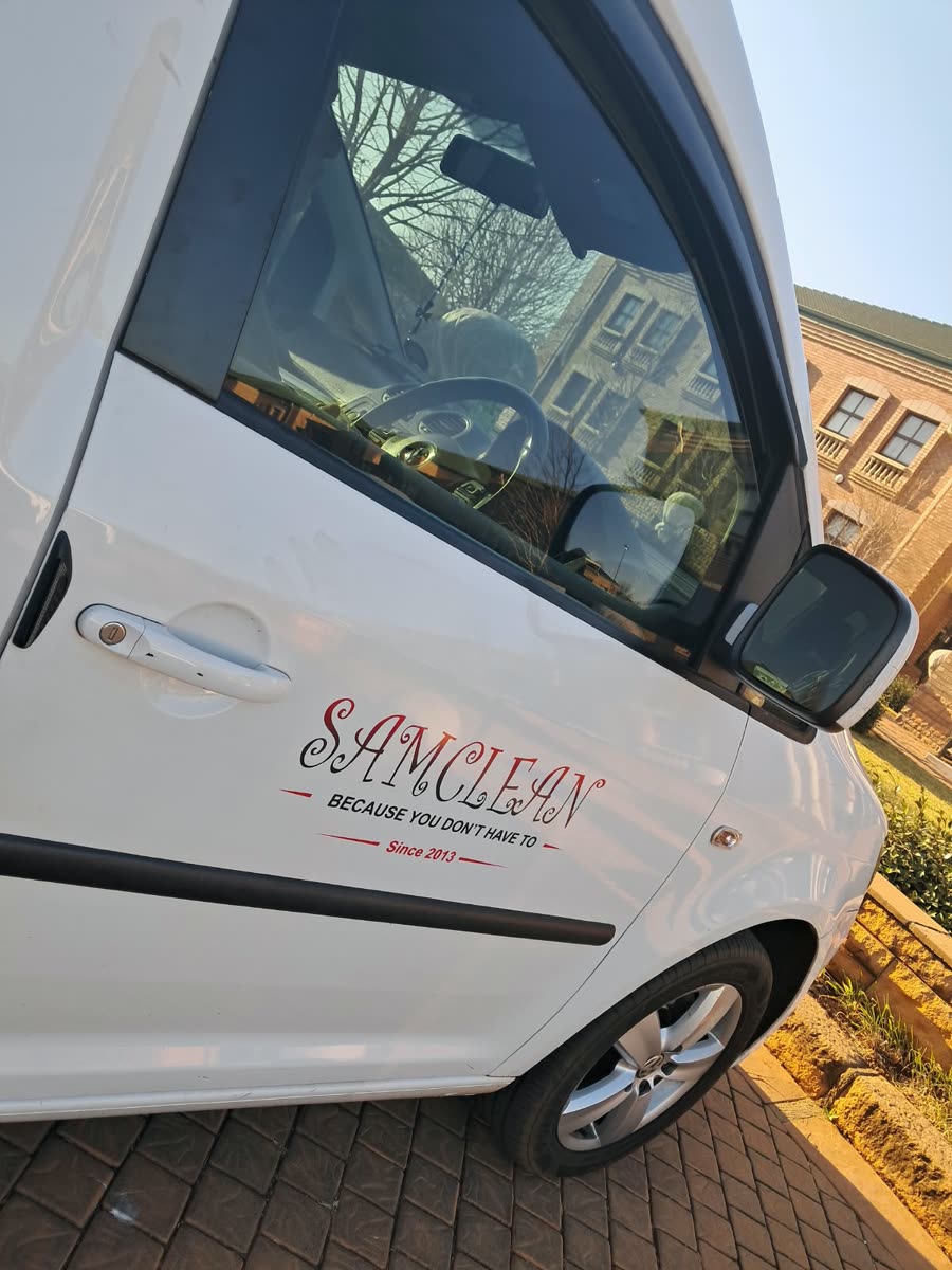 Samclean logo on the door of the company van: Because you don't have to, since 2013